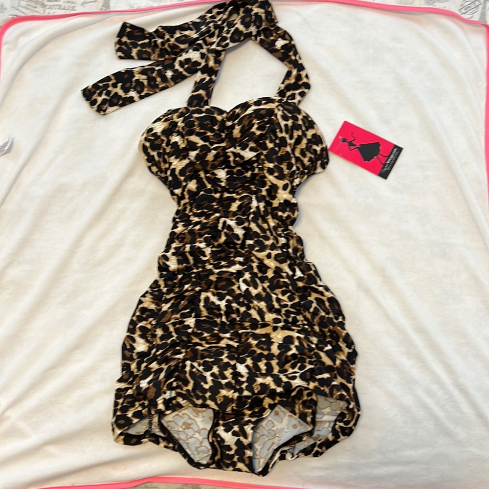 Unique vintage one piece leopard print swimsuit.